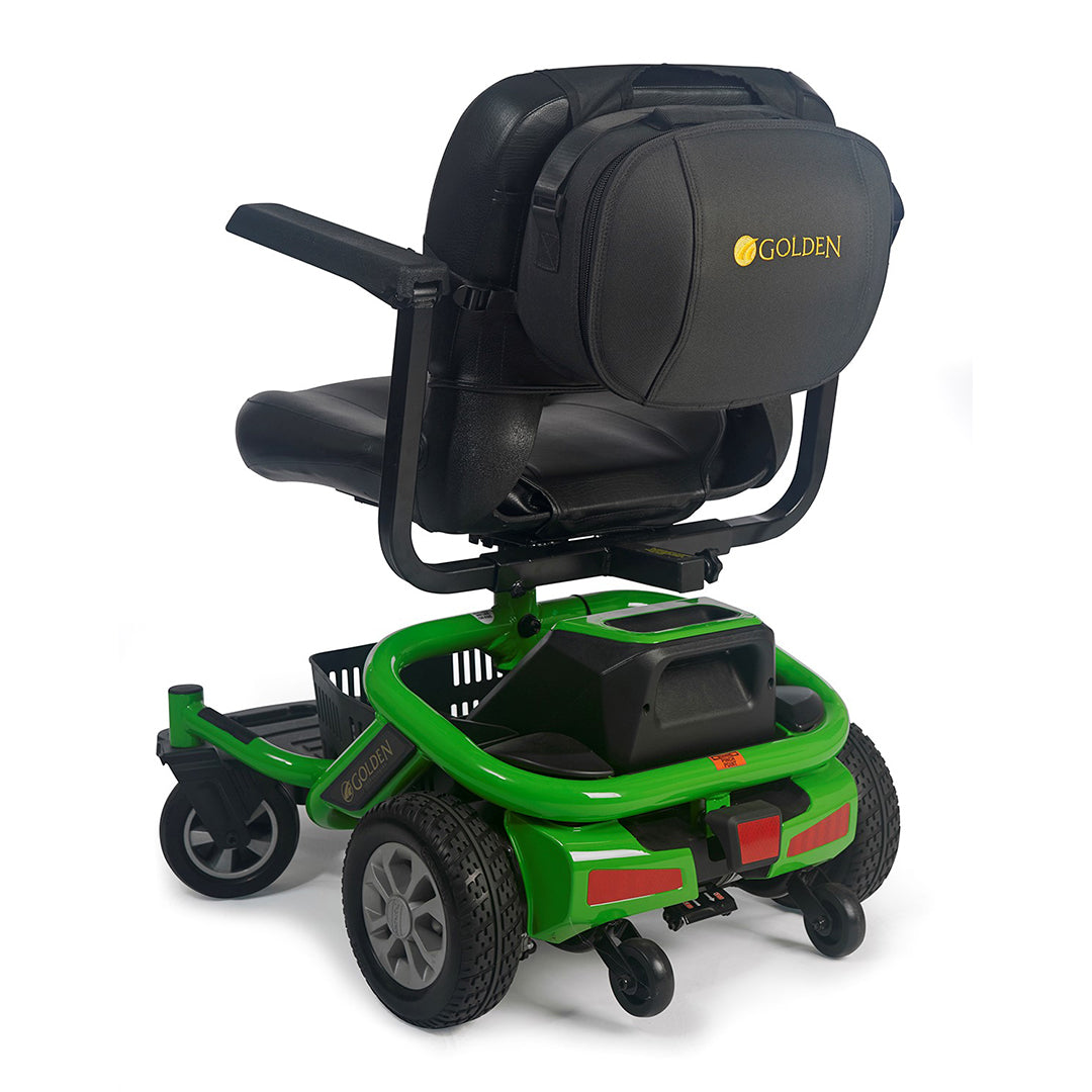 Golden Hard-Sided Travel Case Attached to Wheelchair